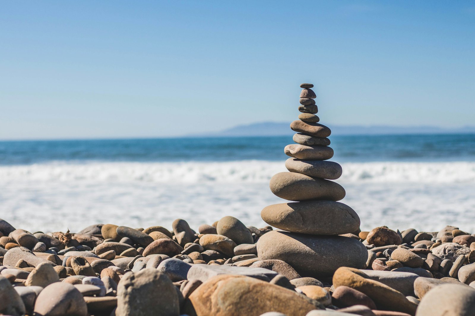 Balanced stones by the sea